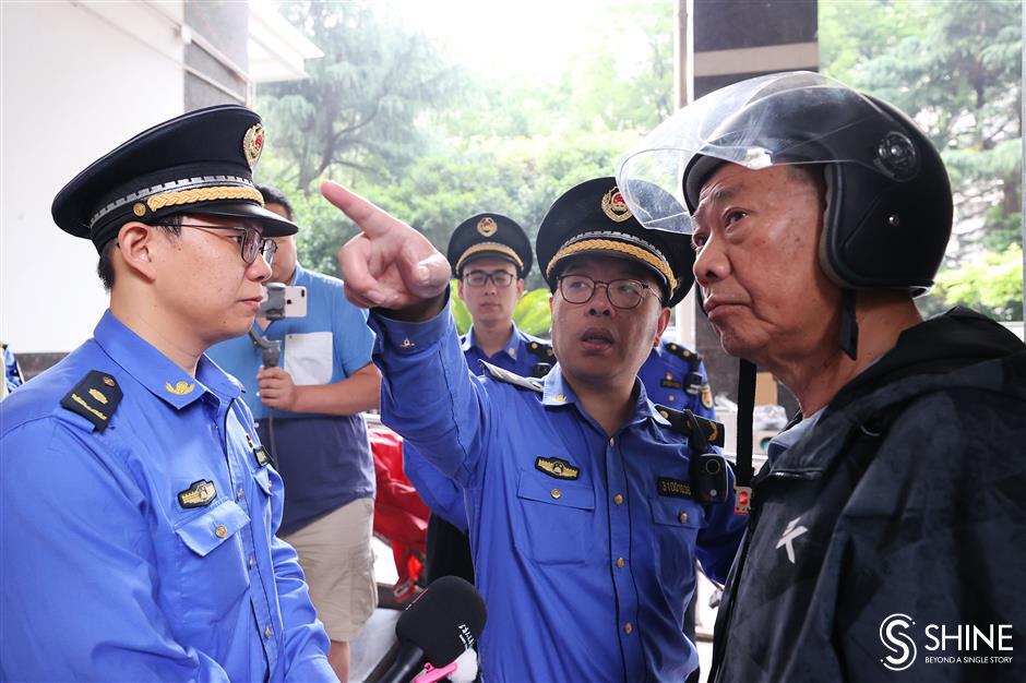 authorities on their bikes to ensure residential building safety