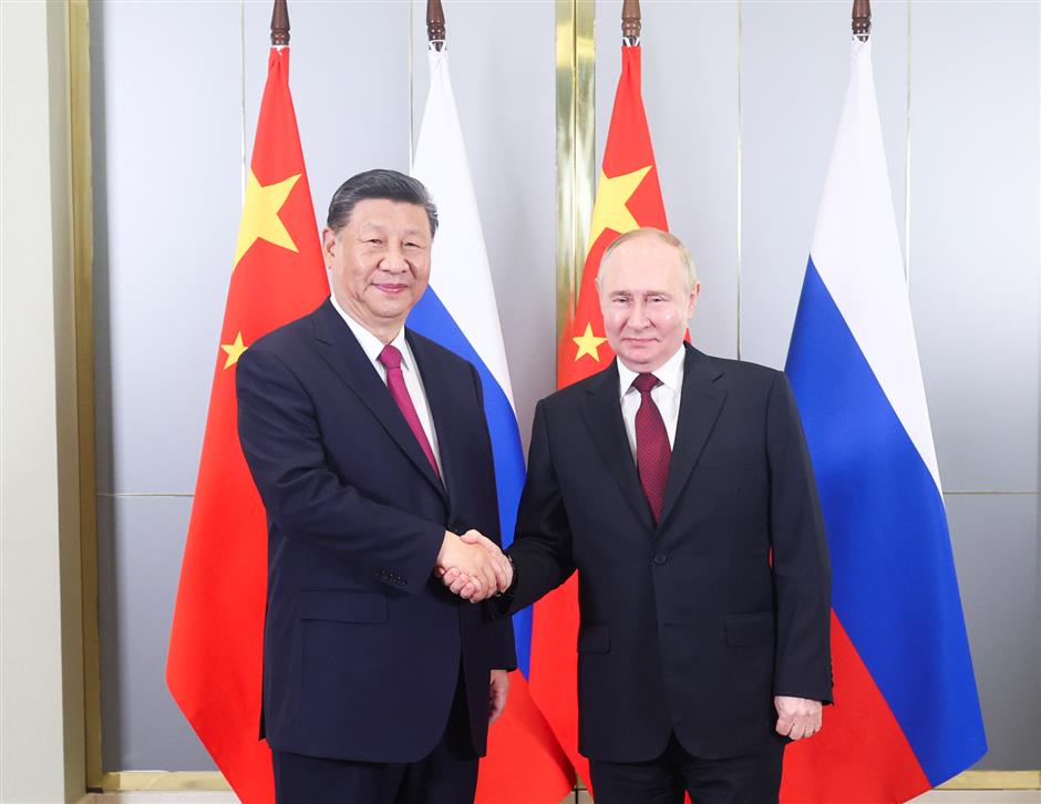 xi urges china, russia to continue strengthening alignment of development strategies