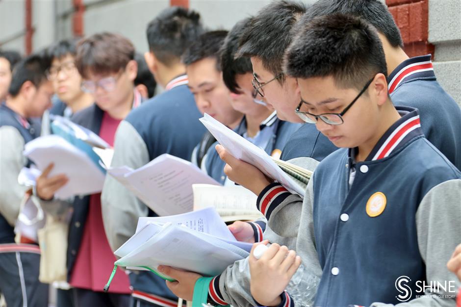 red for good luck as students gather for college entrance exam