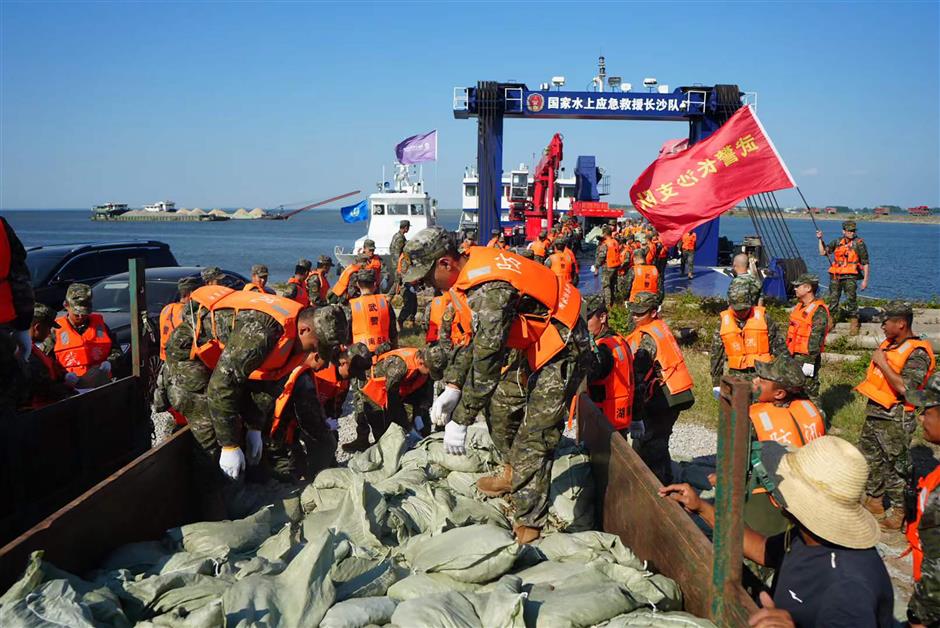 team deployed to aid rescue after dike breach in china's second-largest freshwater lake