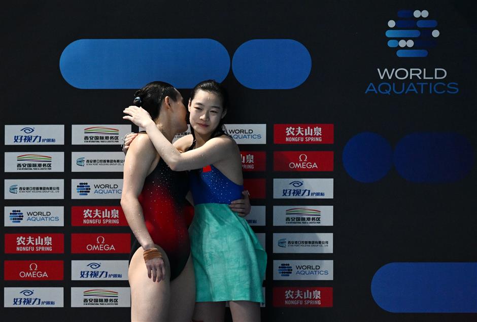 china's wang, chen bring home two more golds at diving world cup