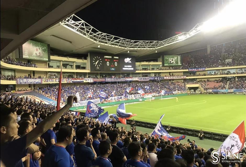 chinese super league kicks off, but fans still await return to stadium terraces