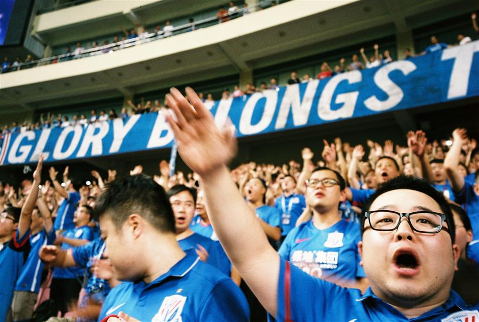 chinese super league kicks off, but fans still await return to stadium terraces