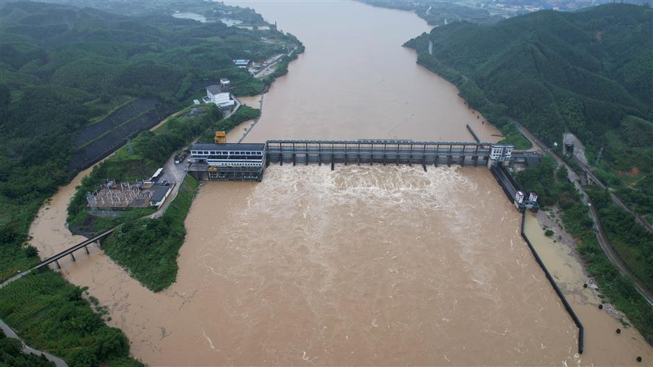 china initiates emergency response to flooding in 3 provinces hit by torrential rains