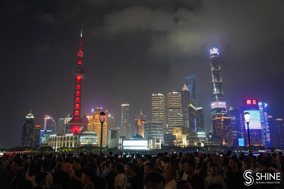 beautiful bund! shanghai dazzles as the night lights come on