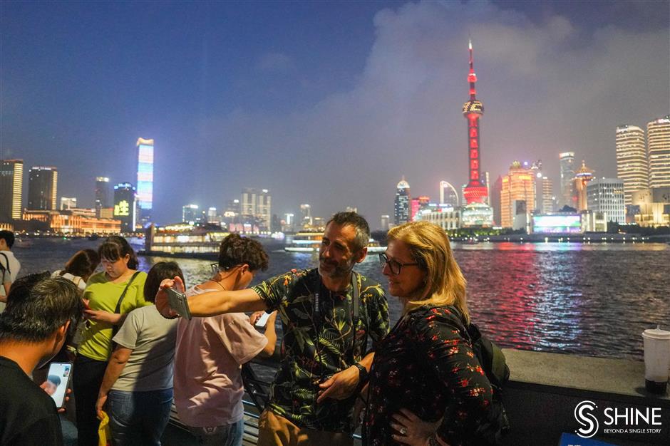 beautiful bund! shanghai dazzles as the night lights come on