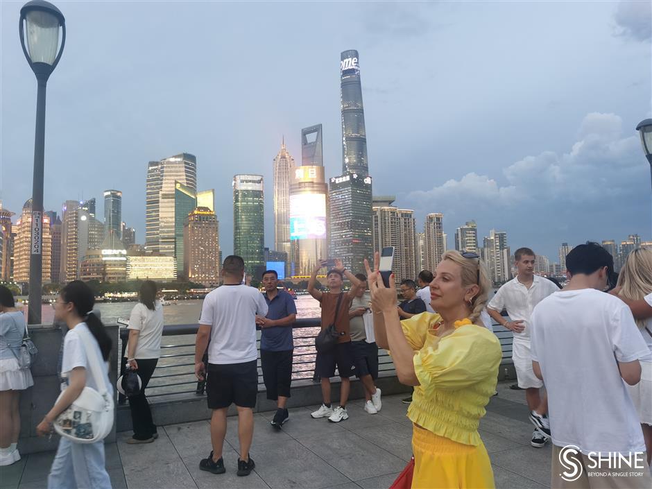 beautiful bund! shanghai dazzles as the night lights come on