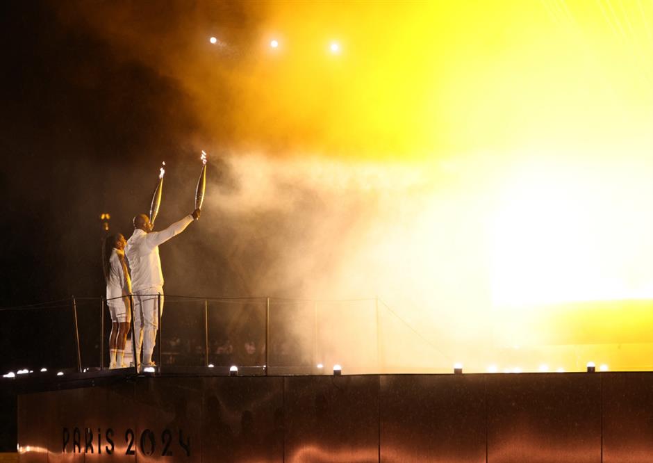 paris olympics opens with historic ceremony on river seine