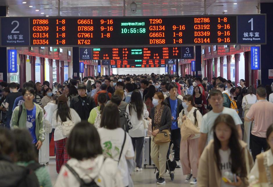 china's 8-day national day holiday sparks travel, consumption frenzy