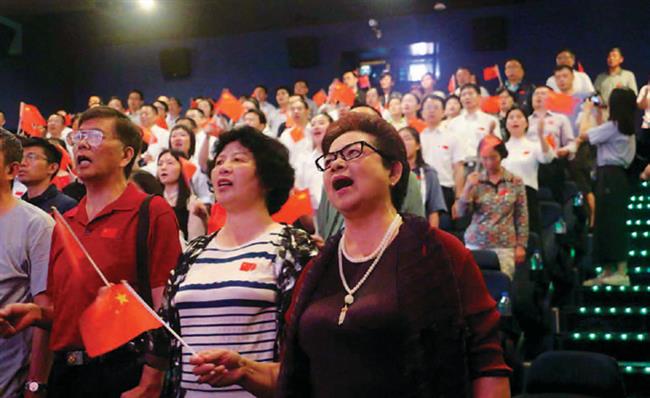 live broadcast from beijing inspires officials and residents as they gather in celebration