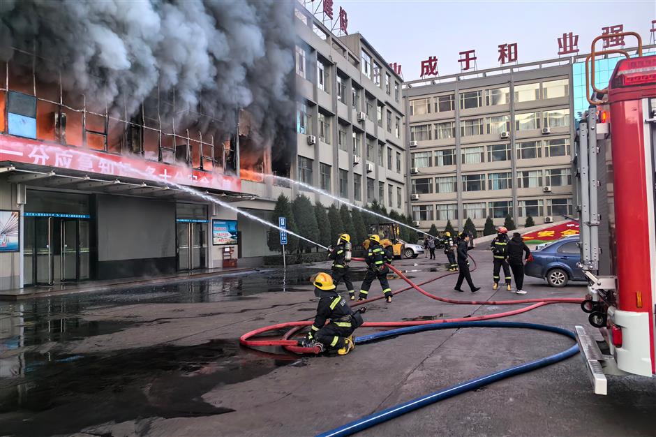 26 dead, 38 injured in north china coal mine company building fire