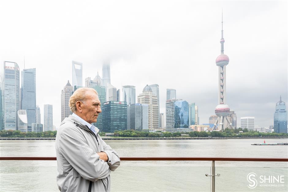 luxury cruise liner docks on north  bund, with 300 international tourists